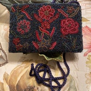 Fun, Small (6 1/4” x 4 1/4”) beaded crossbody handbag w/zipper top Unused